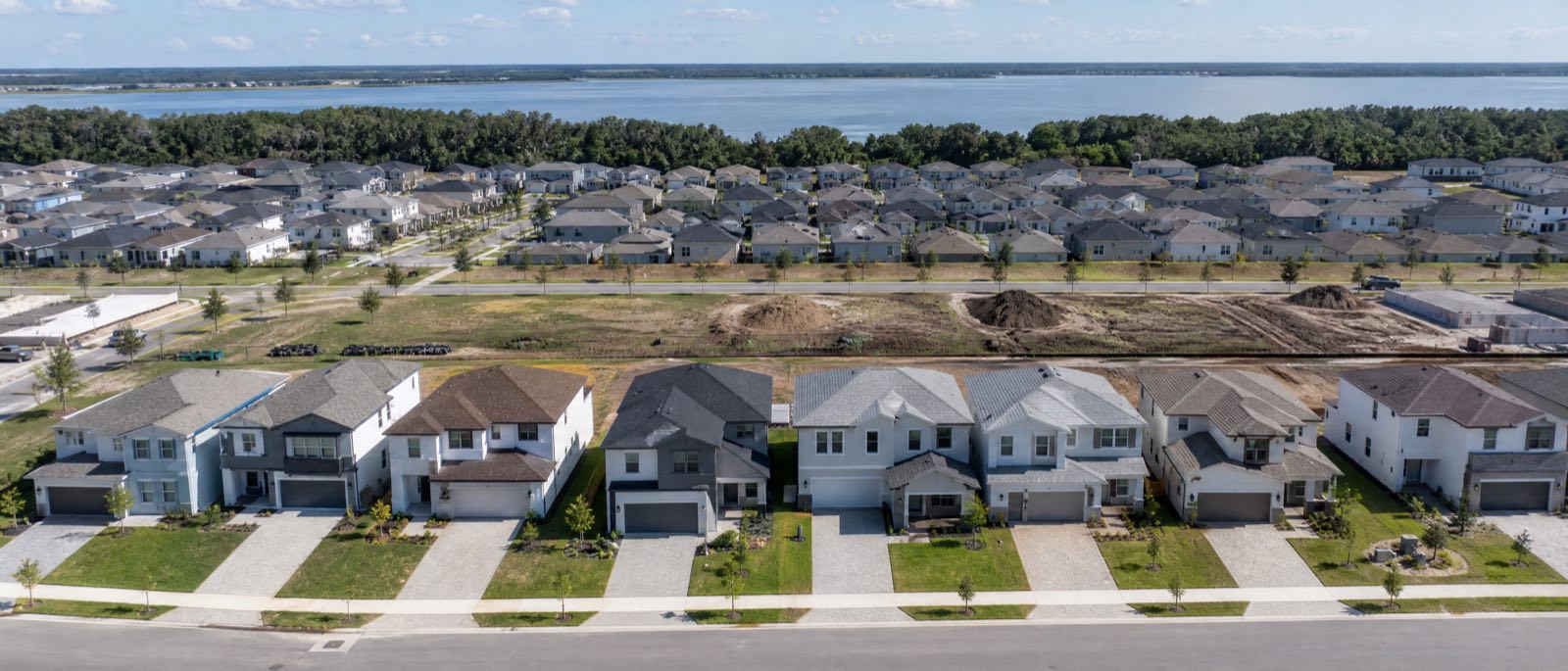 A low aerial view of Winter Garden, Florida, with residential driveways in the foreground